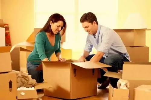 Smiling movers at work — Leoin Packers and Movers Bangalore